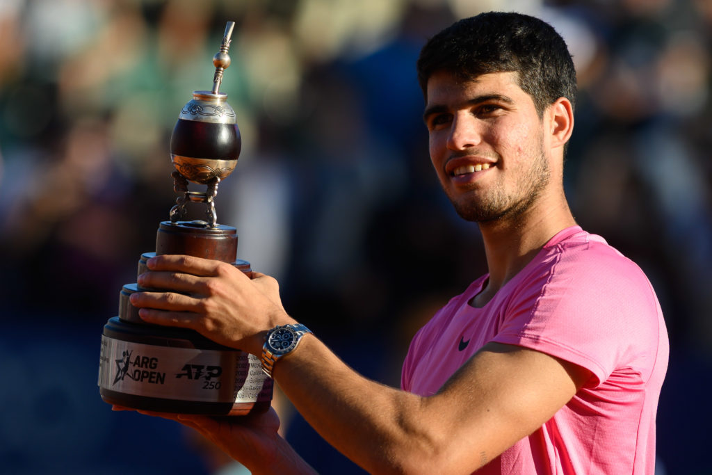 Carlos Alcaraz of Spain lifts the trophy after winning the