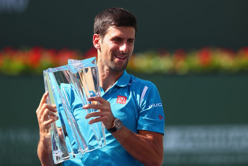 Novak Djokovic holds the Indian Wells title in 2016.