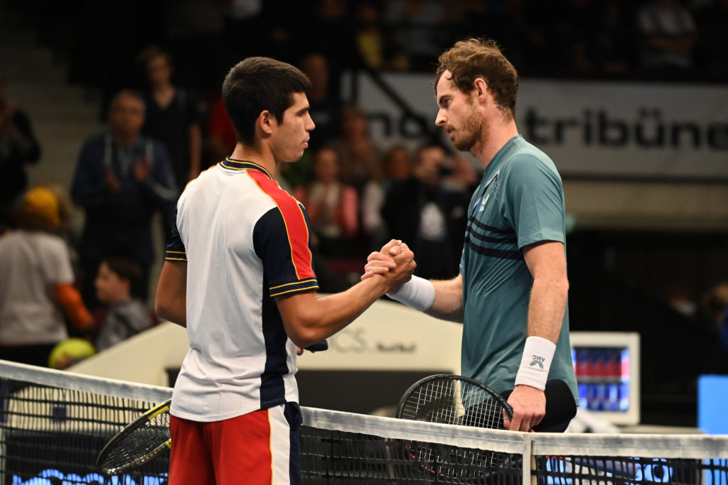 Carlos Alcaraz and Andy Murray shake hands at the Vienna Open in 2021.