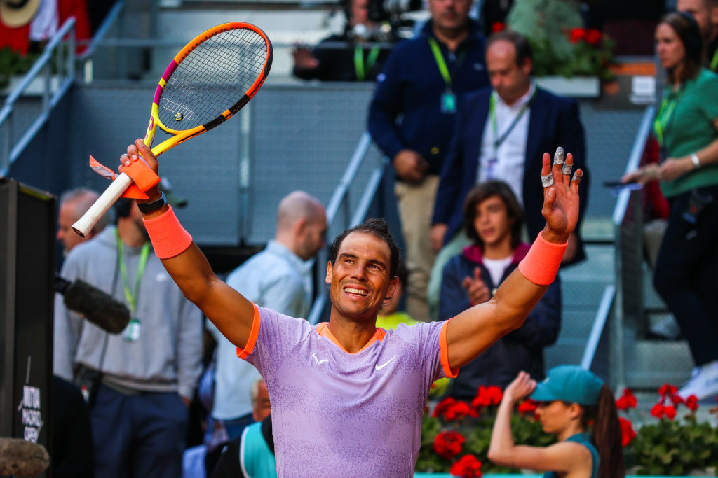 Rafael Nadal of Spain waves on Day Four of the Mutua Madrid
