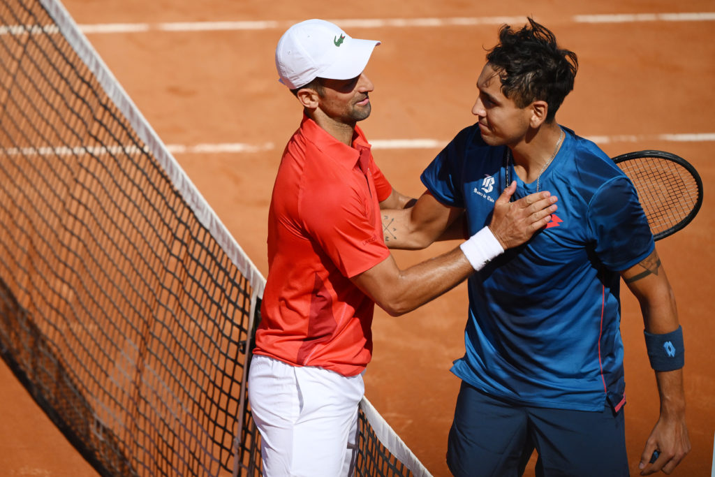 Novak Djokovic of Serbia greets Alejandro Tabilo of Chile at