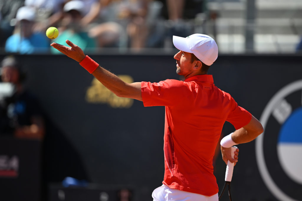Novak Djokovic serving.