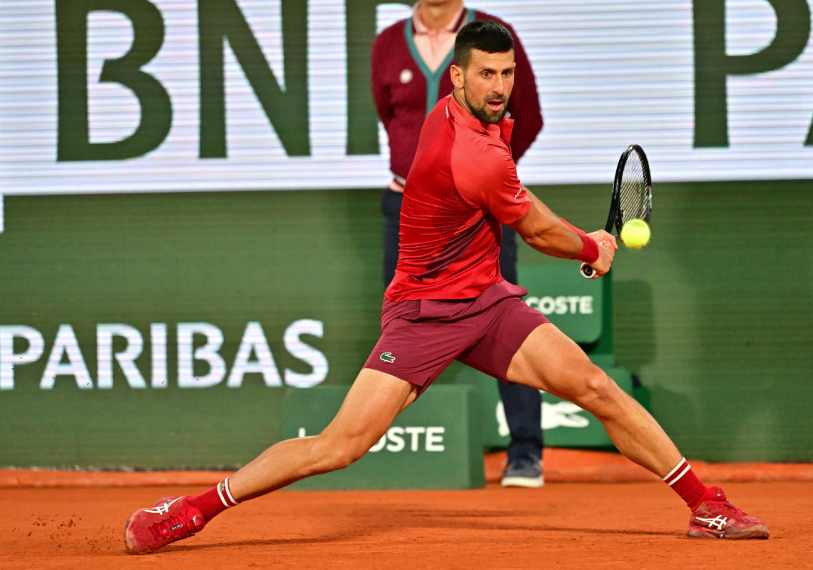 :PARIS, FRANCE - MAY 28: Novak Djokovic of Serbia hits a forehand in action  against Pierre-Hugues Herbert of Franc in the first round of the men's...