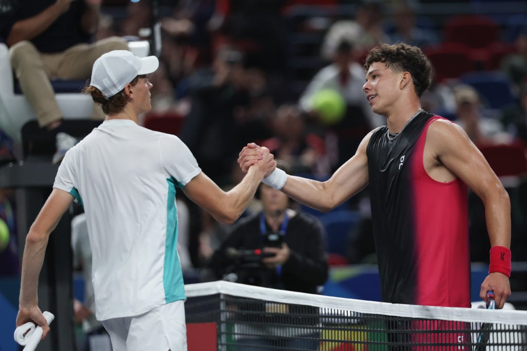 Jannik Sinner and Ben Shelton shake hands at the Shanghai Masters in 2023.