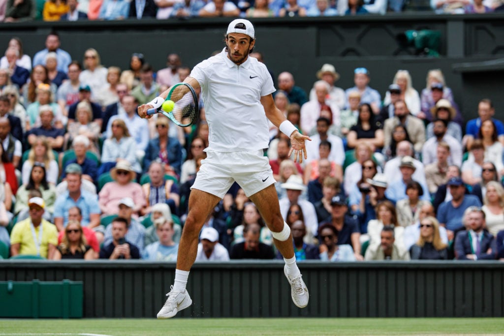 Lorenzo Musetti in action at Wimbledon.