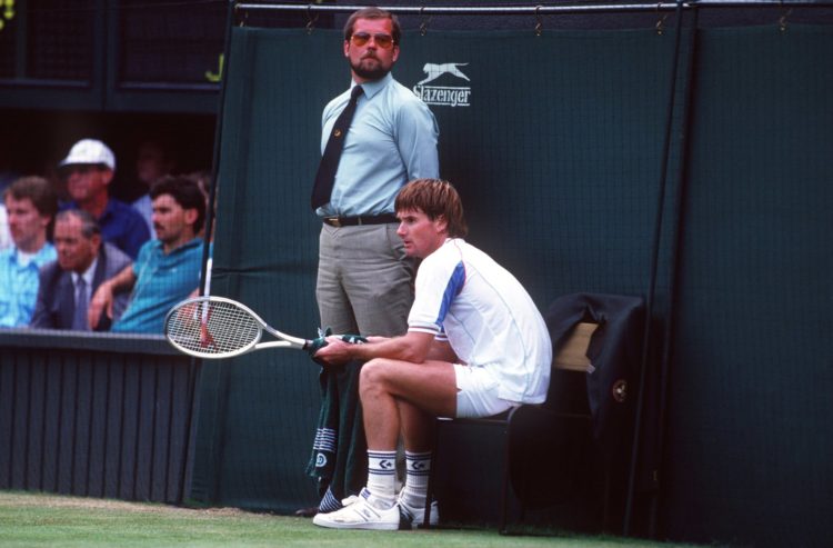 JUN 1987: A PICTURE SHOWING JIMMY CONNORS OF THE UNITED STATES AS HE RESTS DURING A MATCH AT THE WIMBLEDON TENNIS CHAMPIONSHIP Mandatory Credit: A...