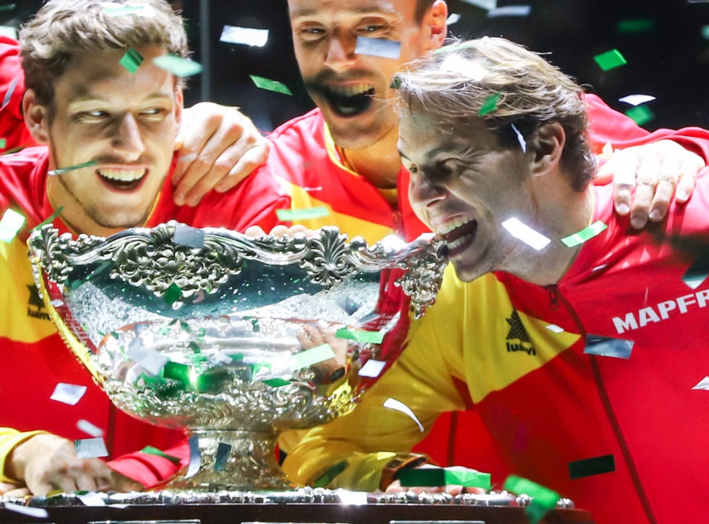 Rafael Nadal bites the trophy after winning the 2019 Davis Cup