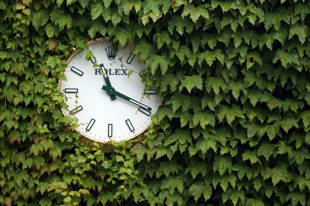 A picture of a clock at Wimbledon.