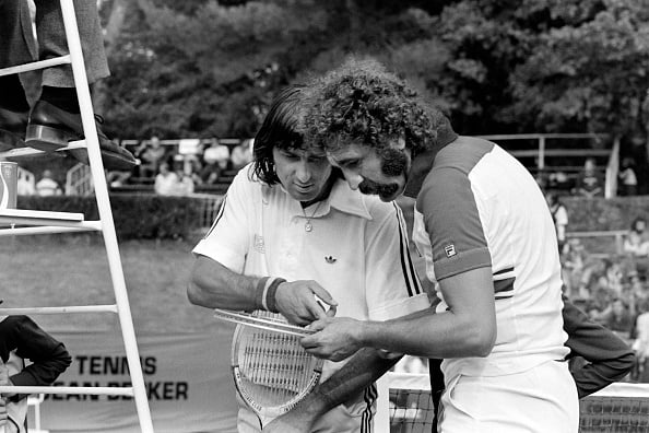 TENNIS-RAQUETTE-OR