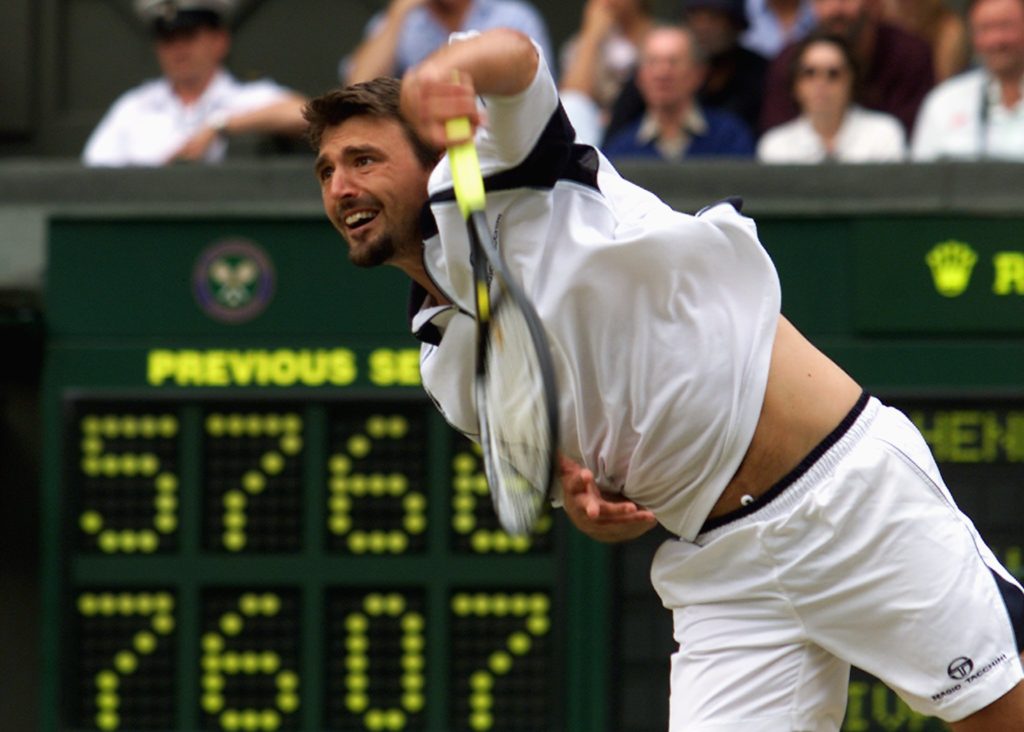 Croatian player Goran Ivanisevic serves during his