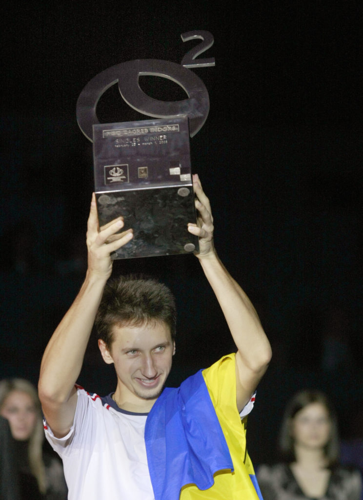 Sergiy Stakhovsky of Ukraine raises the
