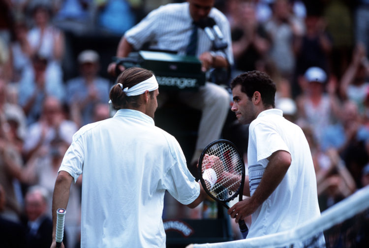 2 Jul 2001: Pete Sampras of the USA congratulates Roger Federer of Switzerland following his victory during the men's fourth round of The All Engl...