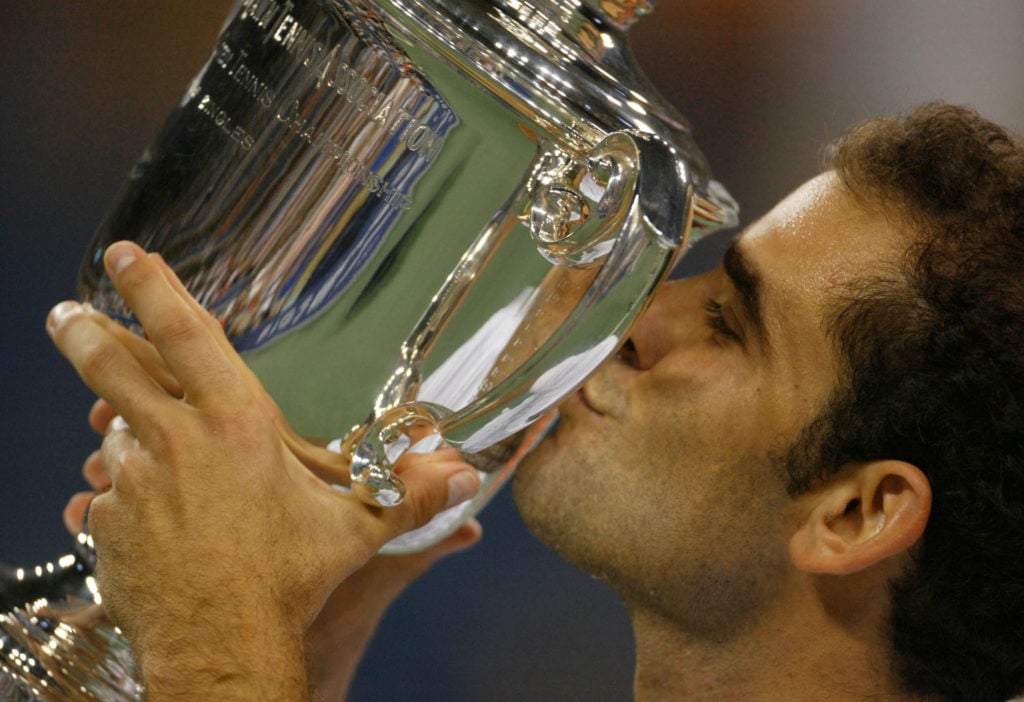 Sampras kisses the trophy