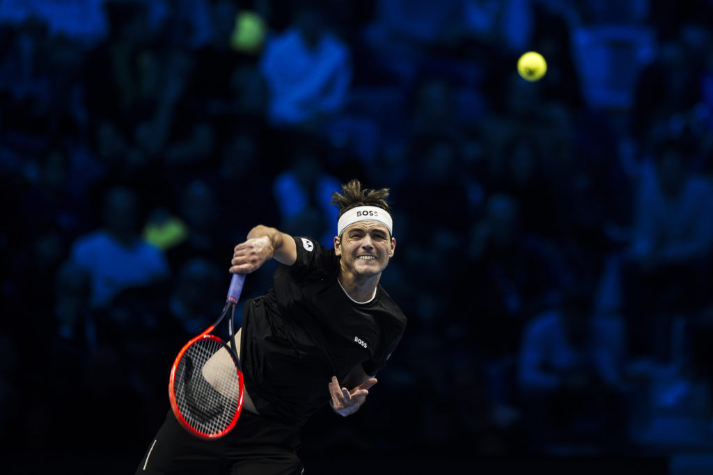 Taylor Fritz of USA serves during his round robin singles