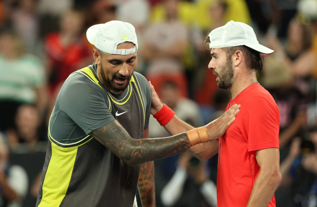 Nick Kyrgios and Jacob Fearnley at the net after their first-round match at the 2025 Australian Open.