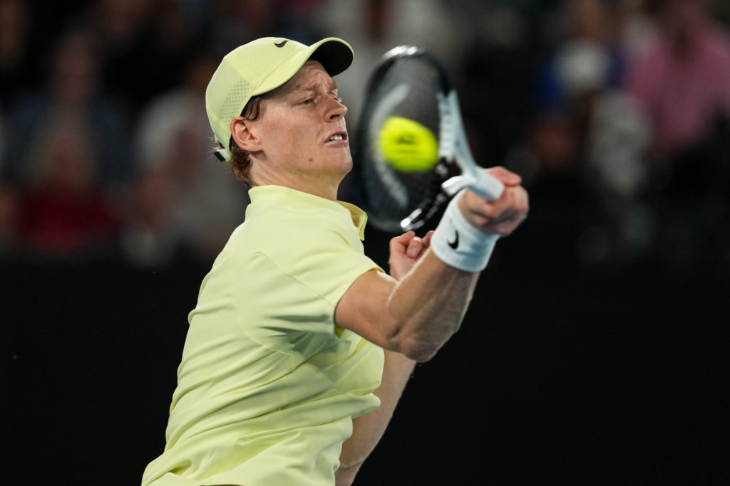 Jannik Sinner hitting a forehand at the Australian Open.