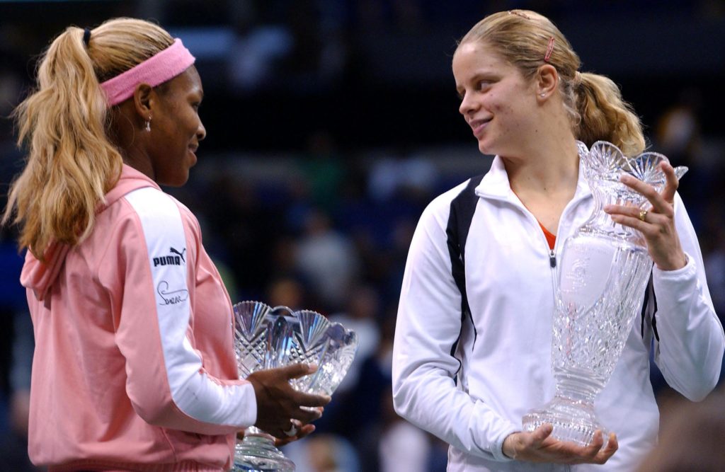 Fifth-seeded Belgian player Kim Clijsters (R) cons