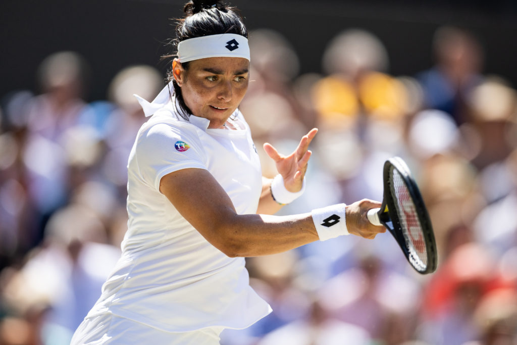 Ons Jabeur playing at Wimbledon in 2022.