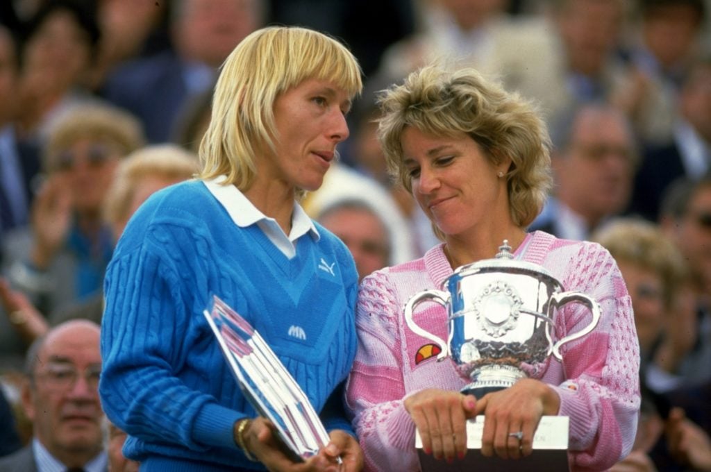 Chris Evert and Martina Navratilova hold their trophies after the 1986 French Open final