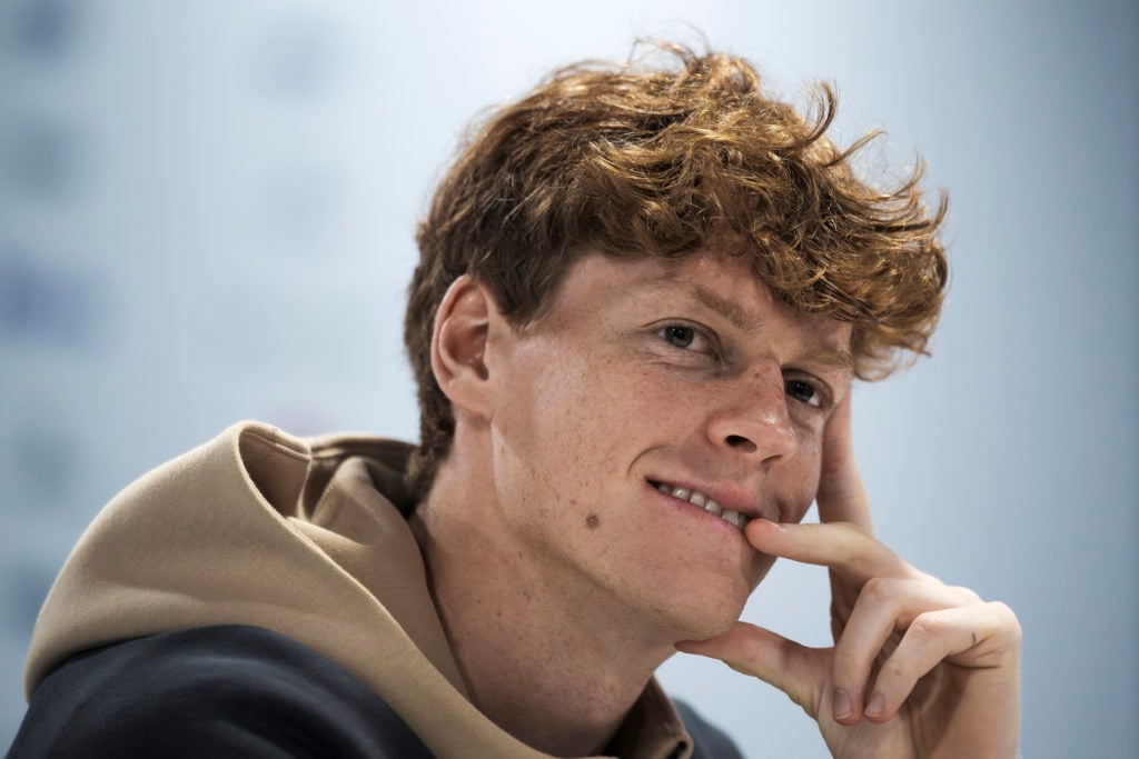 Jannik Sinner of Italy smiles during a press conference at