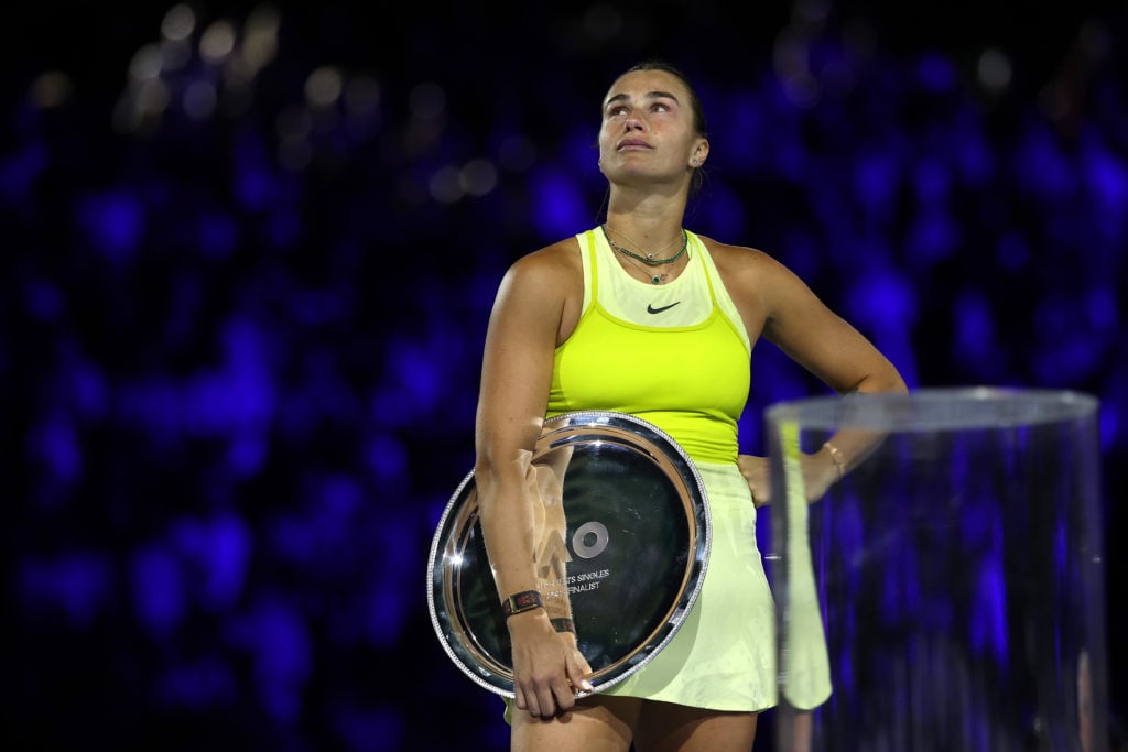 Aryna Sabalenka holds the runners-up trophy after losing to Coco Gauff in the 2025 Australian Open final