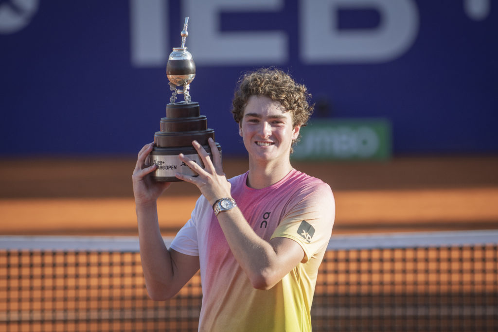 Joao Fonseca of Brazil carries the trophy after winning the Argentina Open title.