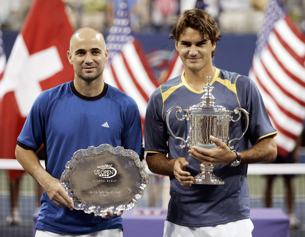 Roger Federer of Switzerland (R) and And
