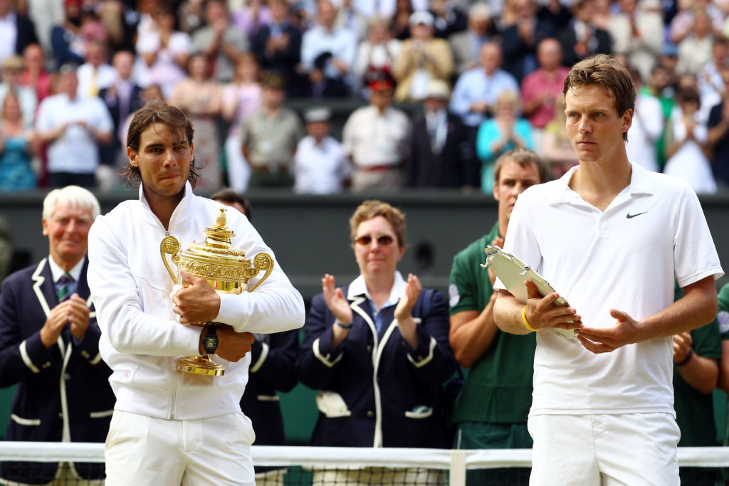 Rafael Nadal and Tomas Berdych holding their trophies after the Wimbledon final in 2010.