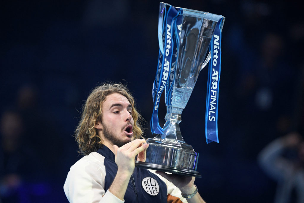 Stefanos Tsitsipas celebrates with the ATP Finals title in 2019
