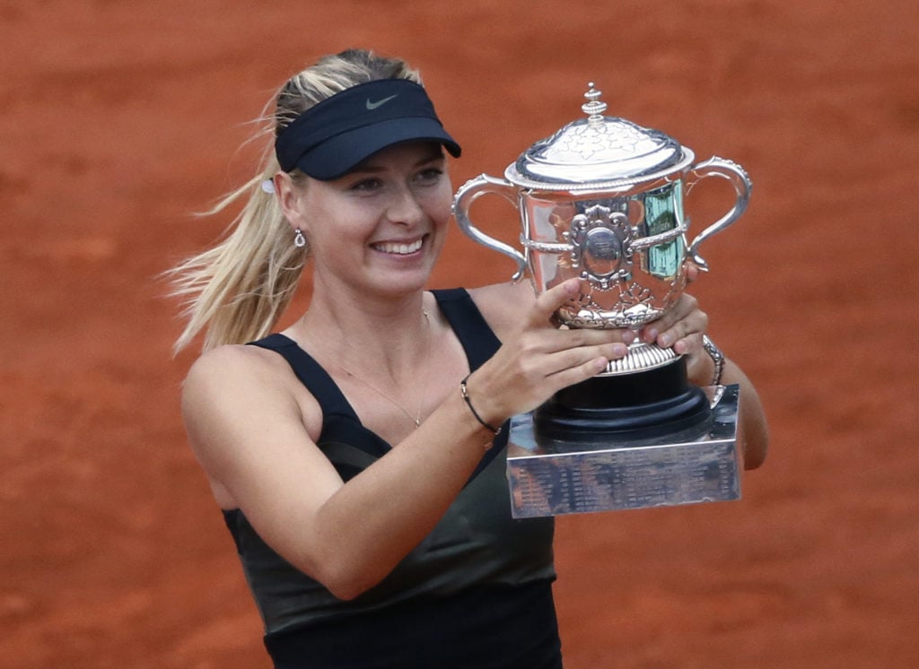Russia's Maria Sharapova holds her trophy after winning the French Open in 2012