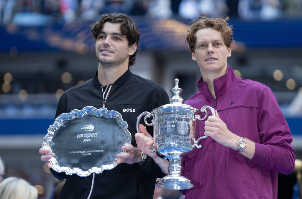 Taylor Fritz and Jannik Sinner pose with their trophies after the 2024 US Open final