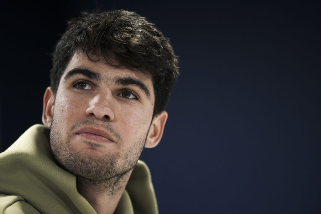 Carlos Alcaraz of Spain looks on during a press conference