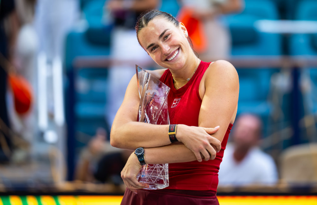 Aryna Sabalenka poses with the champions trophy after defeating Jessica Pegula of the United States in the womens singles final on Day 12 of the Miami Open at Hard Rock Stadium.