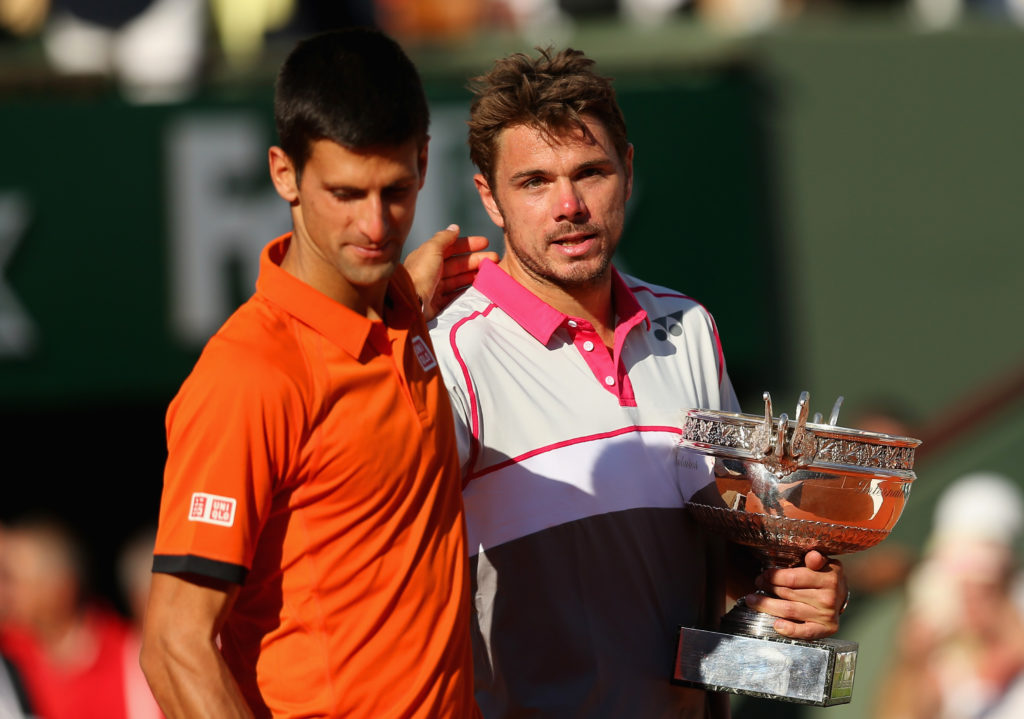 Novak Djokovic and Stan Wawrinka at the 2015 French Open trophy ceremony.