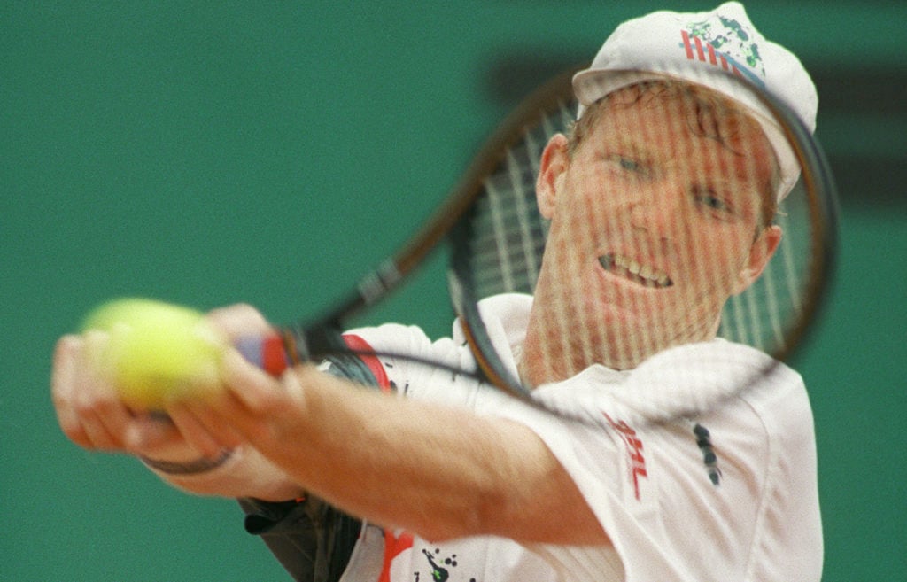 US Jim Courier returns a backhand to Ukrainian opp