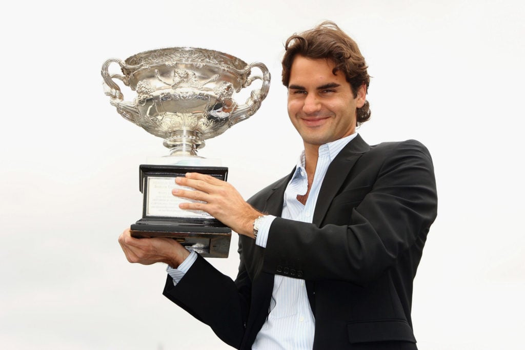 Roger Federer poses with the 2007 Australian Open title