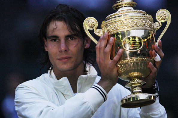 Spain's Rafael Nadal poses with his trop