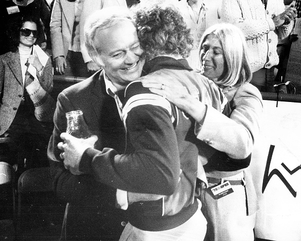 Mother and father congratulate John McEnroe after winning U.