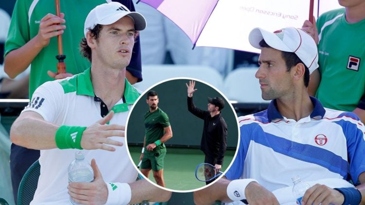 Novak Djokovic (R) of Serbia talks with Andy Murray of Great Britain during a change over of their doubles match against Sergiy Stakhovsky of the U...