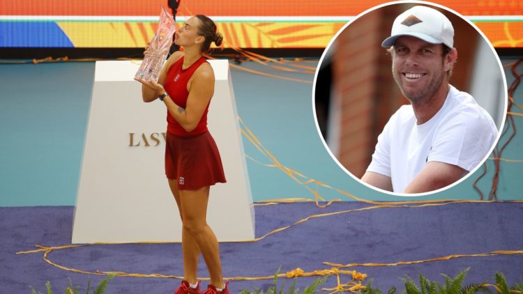 Aryna Sabalenka celebrates winning the Butch Buchholz Trophy after defeating Jessica Pegula of the United States during the women's singles final o...