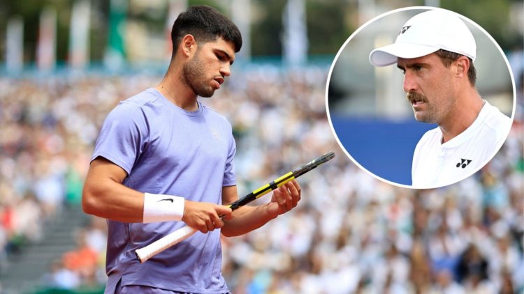 Carlos Alcaraz reacts as he plays against France's Arthur Fils during the Monte Carlo ATP Masters Series Tournament quarter-final tennis match on t...