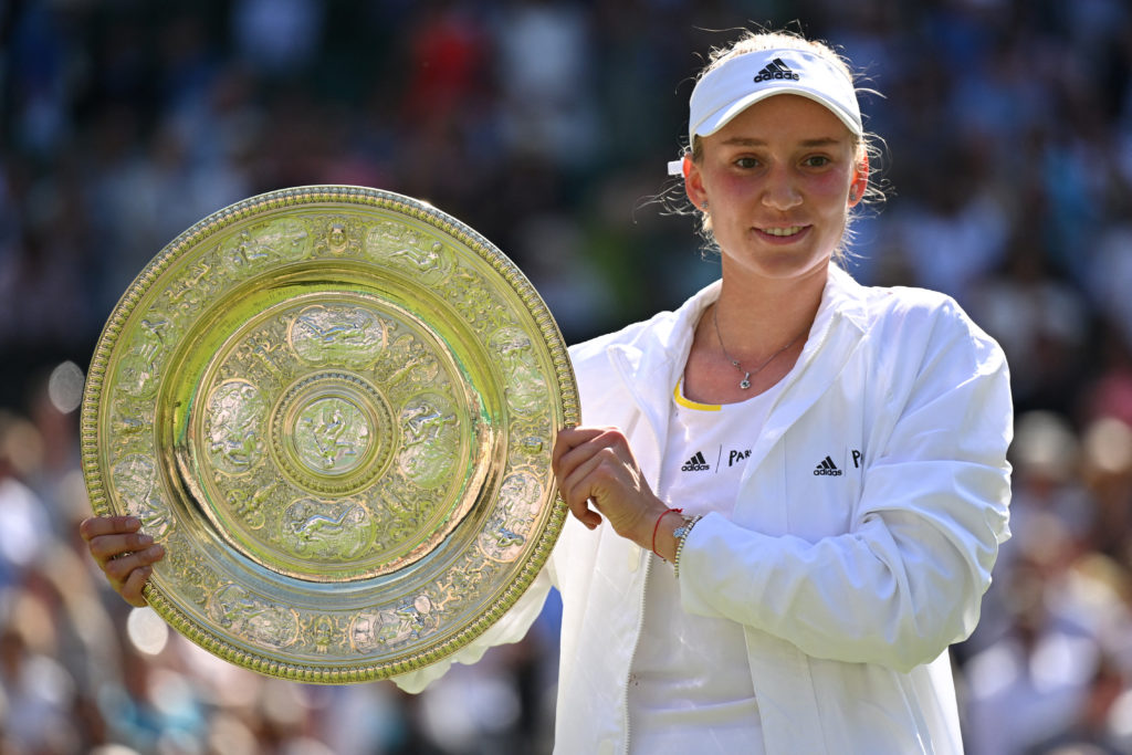 Elena Rybakina poses with the Venus Rosewater Dish after winning Wimbledon in 2022