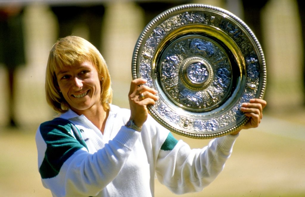 Martina Navratilova of the USA holds up the winner plate after winning