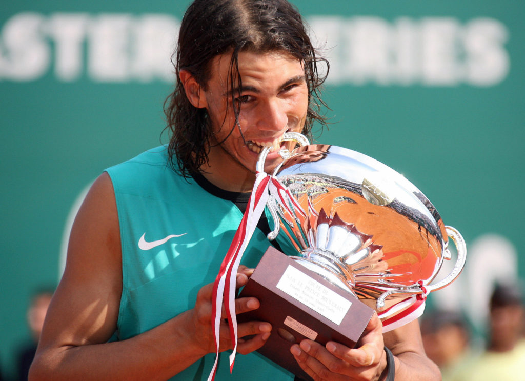 Spanish Rafael Nadal bites his trophy af