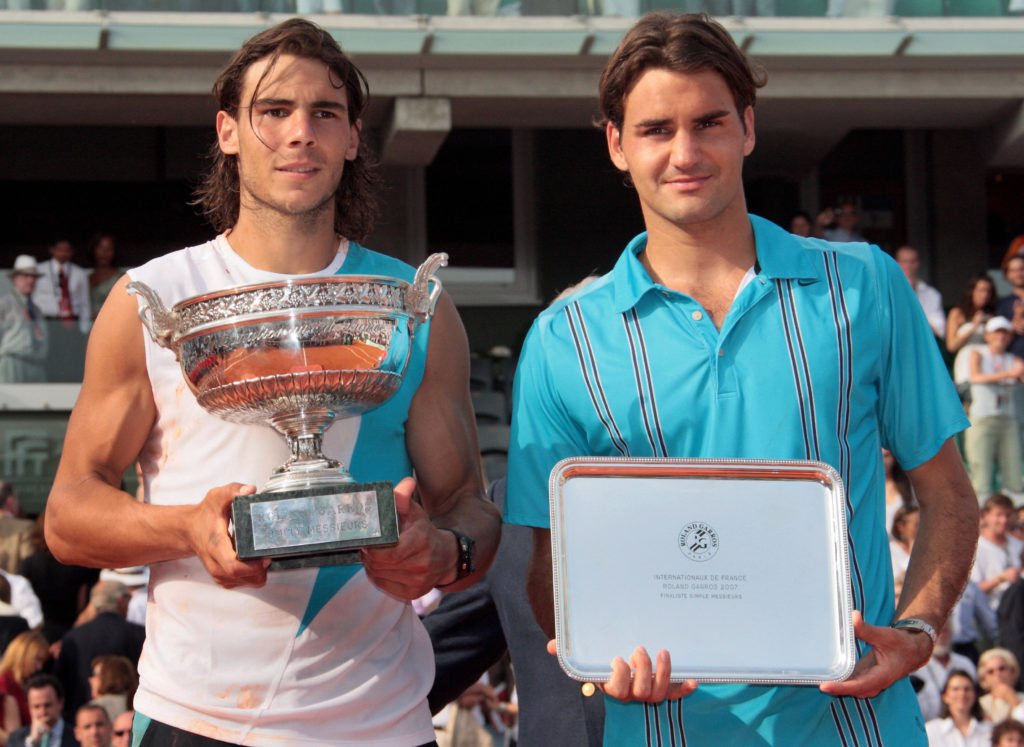 Spanish player Rafael Nadal (L) and Swis