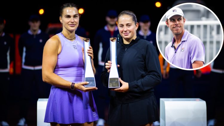 Runner-up Aryna Sabalenka and champion Jelena Ostapenko of Latvia pose with their trophies after the singles final on Day 7 of the Porsche Tennis G...
