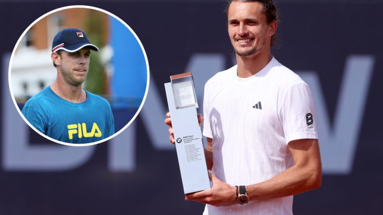 Alexander Zverev of Germany poses with the trophy and a pair of Lederhosen after winning the final match against Ben Shelton of USA on day nine of ...