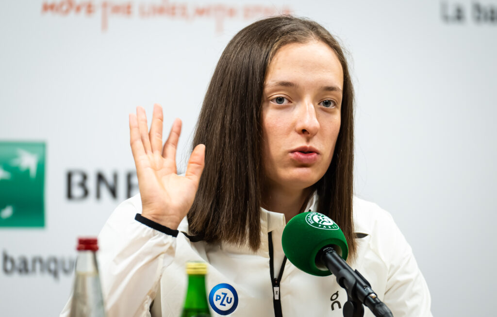 Iga Swiatek answers questions during a 2023 French Open press conference