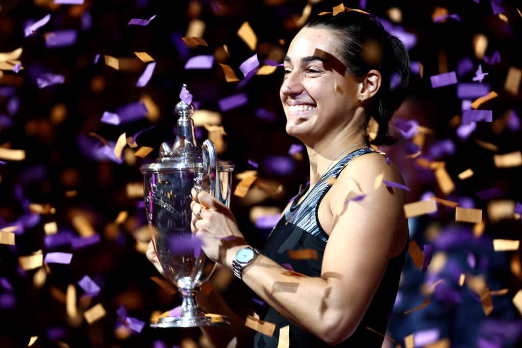 Caroline Garcia lifts the trophy after winning the 2022 WTA Finals