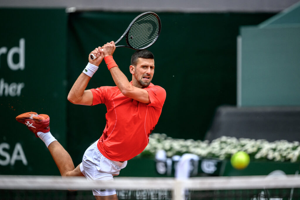 Novak Djokovic returning the ball to Yannick Hanfmann a the 2024 Geneva Open